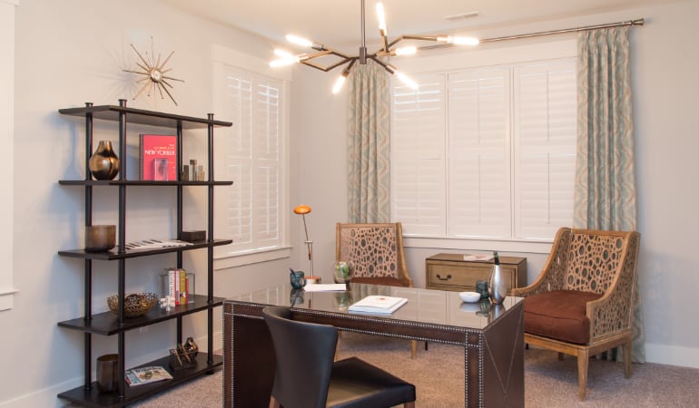 Cleveland home office with plantation shutters.